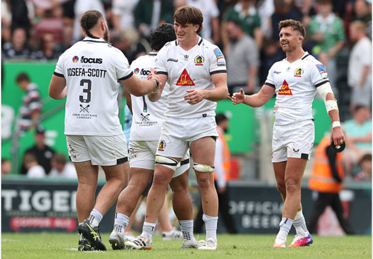 Tom Hooper of Exeter Chiefs celebrates with Josh Iosefa-Scott after their victory during the Gallagher PREM match between Leicester Tigers and Exeter Chiefs at Mattioli Woods Welford Road Stadium on May 31, 2026 in Leicester, England. David Rogers/Getty Images