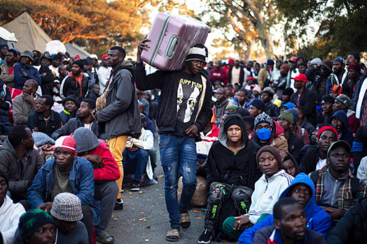 Malawian nationals wait to board buses outside the Malawian Consulate General in Johannesburg,South Africa on June 29, 2026 at 11:16 AM. Photo: Per-Anders Pettersson/Getty Images