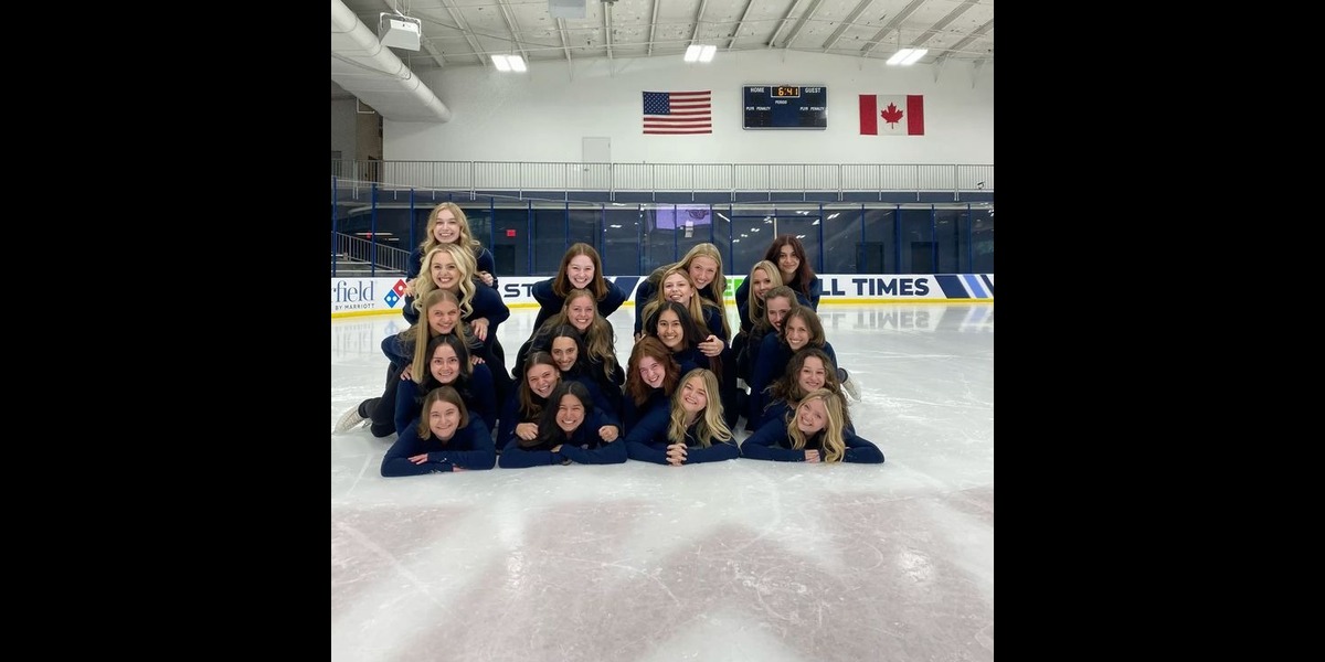 Members of the Liberty University skating team posed for a photo during winter in LaHaye Ice Center in Lynchburg, Virginia, December 15, 2024