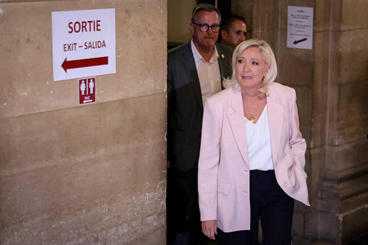 French court allows Marine Le Pen to run — but orders home monitoring
