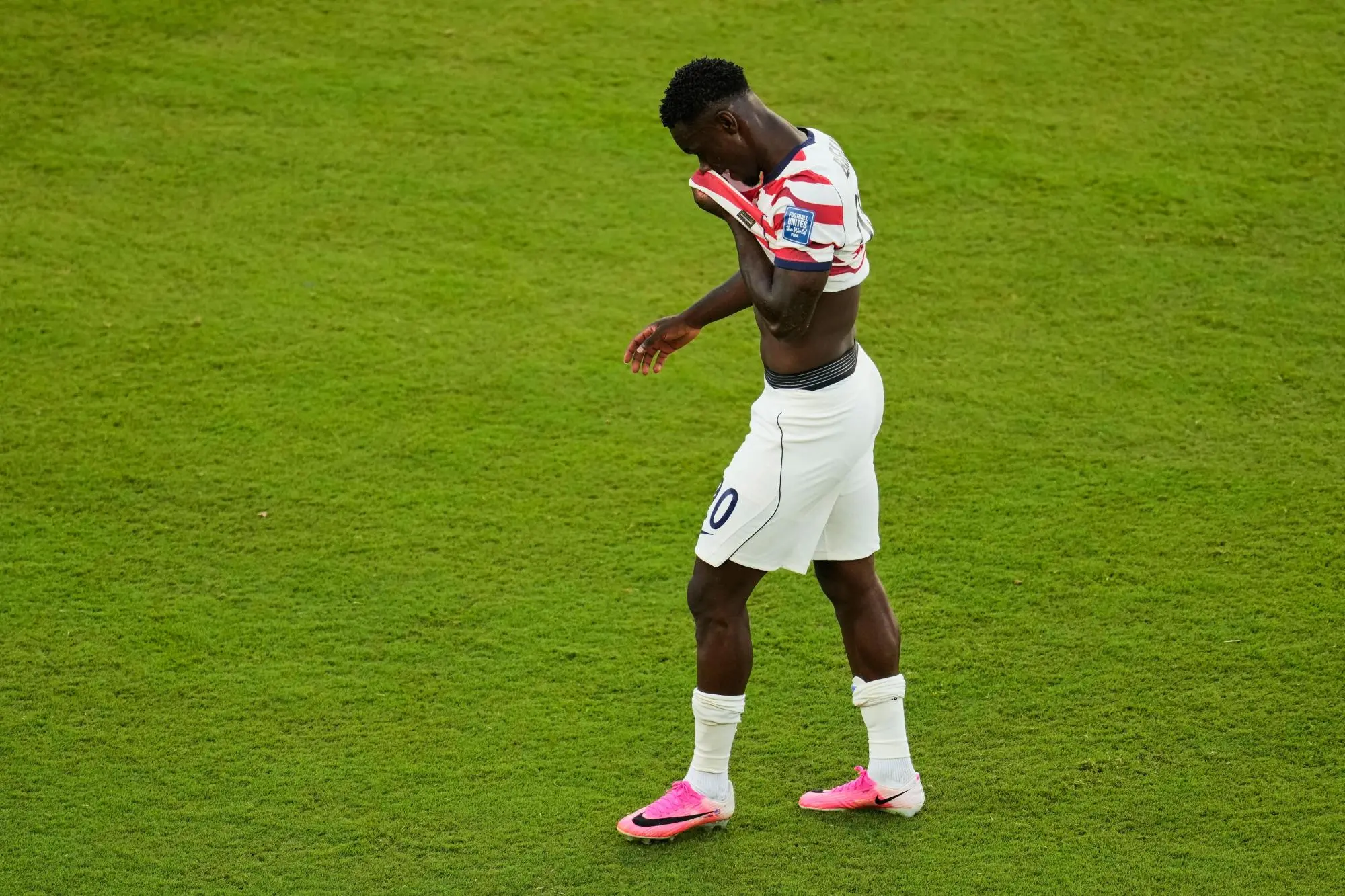 United States’ Folarin Balogun walks off the field after receiving a red card during the World Cup round of 32 soccer match between the United States and Bosnia in Santa Clara, Calif near San Francisco, Wednesday, July 1, 2026. (AP Photo/Jeff Chiu). Photo: Jeff Chiu/AP. © 2026 AP
