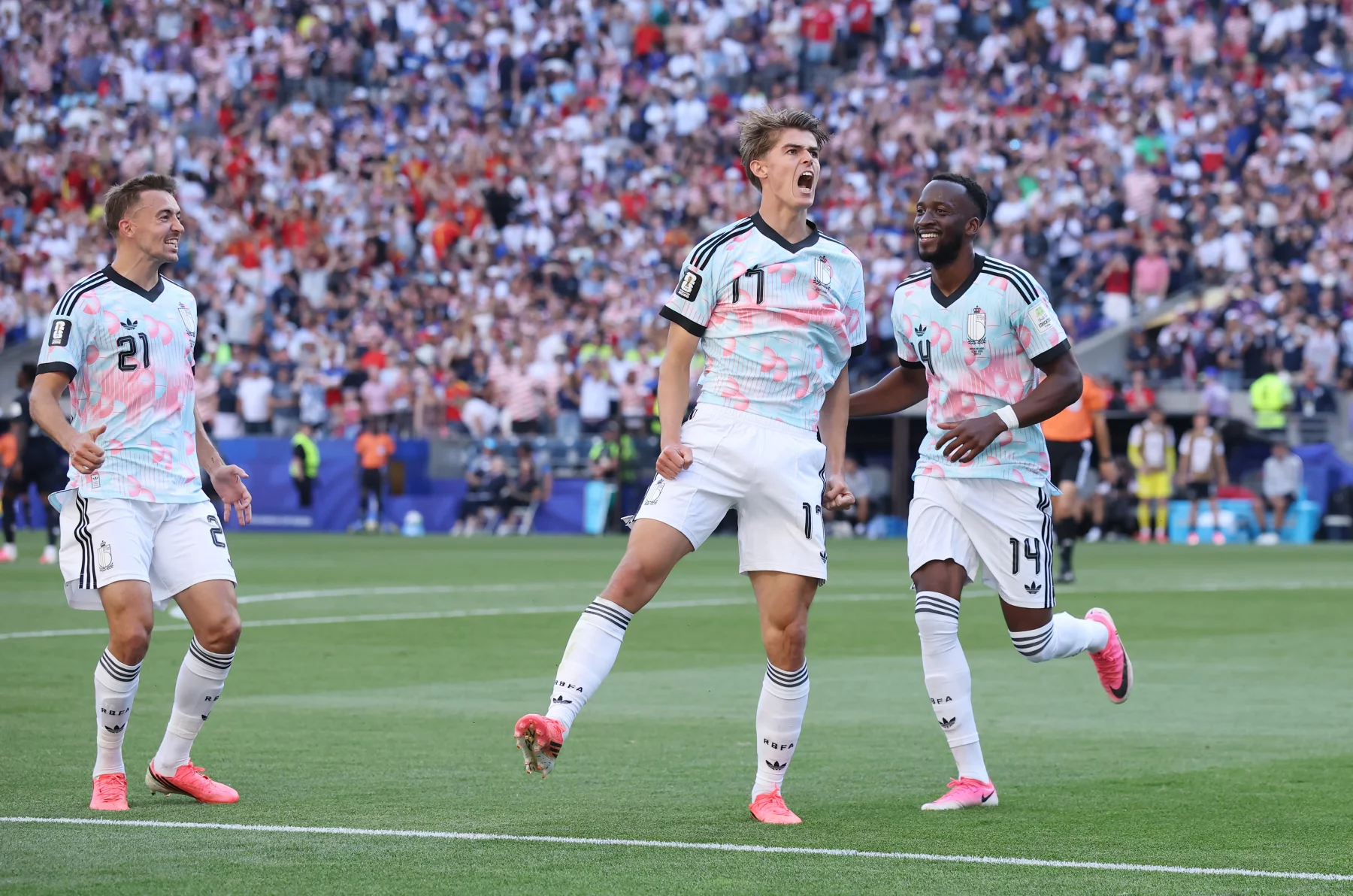 Charles De Ketelaere (middle), of Belgium celebrates after scoring his team's second goal during the World Cup round of 16 match against the USA in Seattle. Photo: Alex Grimm/Getty Images. © 2026 Getty Images.