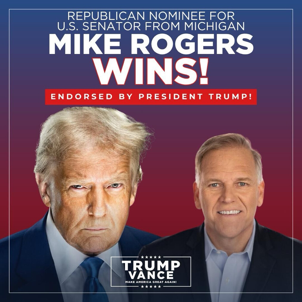 A campaign graphic featuring President Donald J. Trump and Mike Rogers is displayed at Washington D.C.