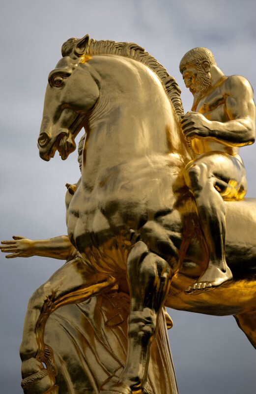 Donald J. Trump posted an image of a gilded rearing horse statue on Truth Social on 08/01/2026.