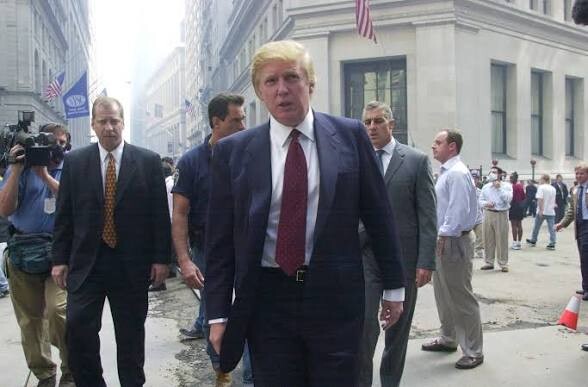 Trump Shares Image of Man Walking on Flag-Lined City Street