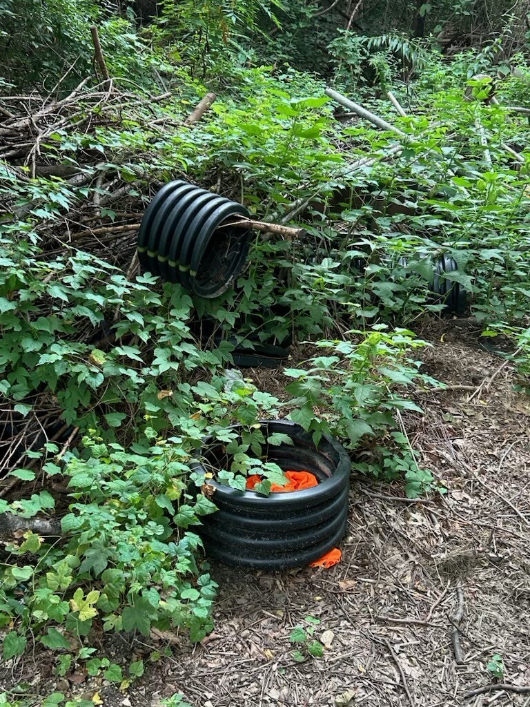 A neglected golf driving range is pictured at an unidentified location on 10/20/2026. The images were shared by President Donald J.