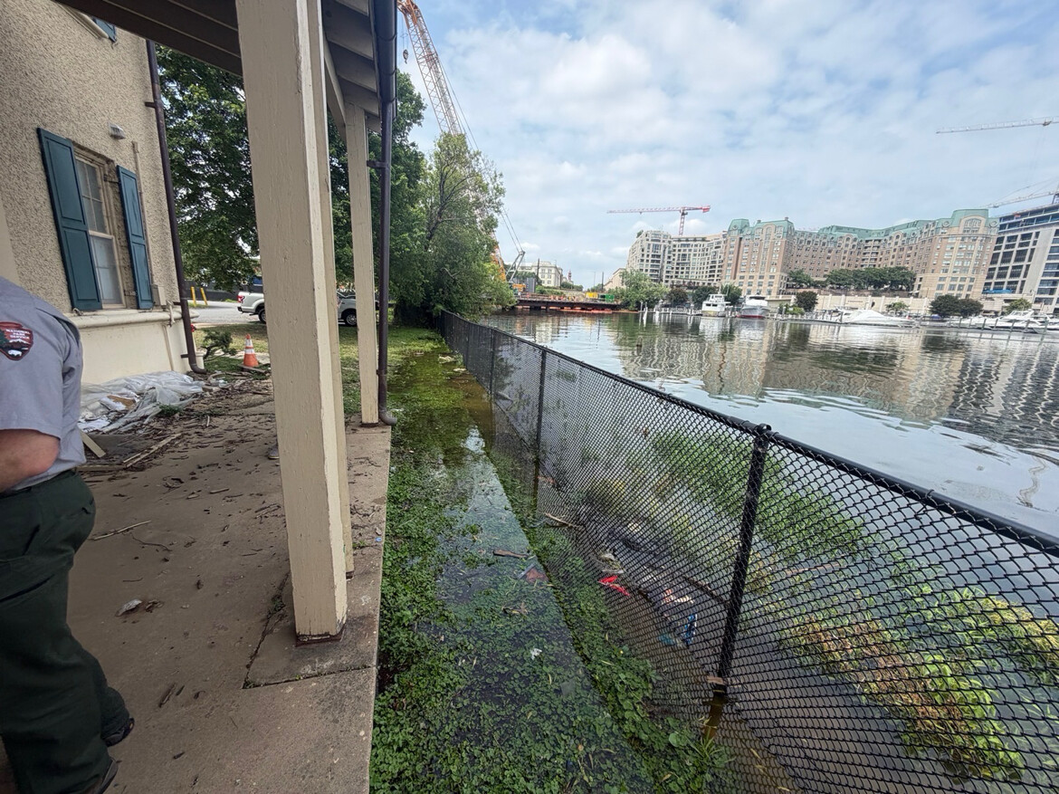 Waterfront infrastructure damage and flooding is pictured along a river at Washington D.C. on 10/20/2026.
